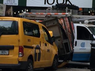 Taxi Jumped Curb in Street Vendor Accident