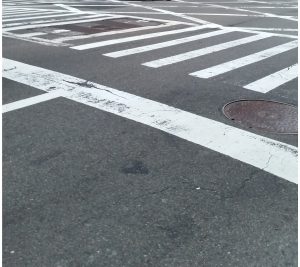 Woman hit by 2 vehicles in crosswalk